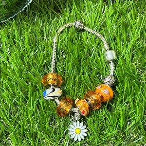Daisy Charm Silver Bracelet with Orange Beads